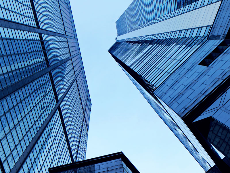 1upward angle shot of tall buildings, middle market businesses